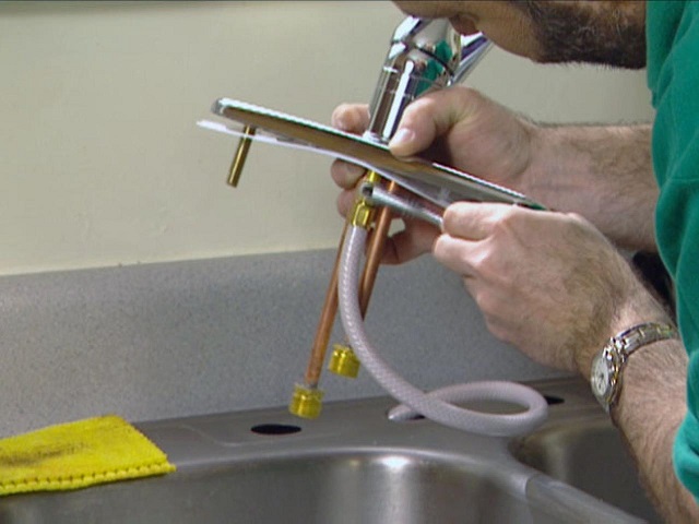 kohler single handle kitchen sink pull down sprayer faucet