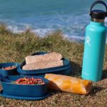 Packed lunch and water by the sea