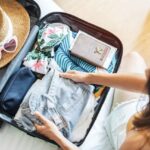 woman packing her suitcase