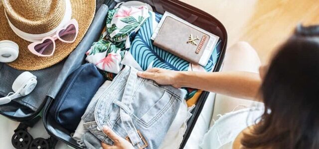 woman packing her suitcase